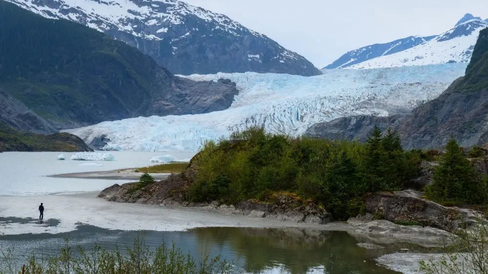 Tourist visiting Mendenhall Glacier. Juneau. Alaska.