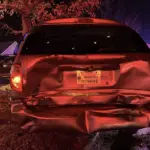Kansas woman injured after rear-end crash pushed van into a tree