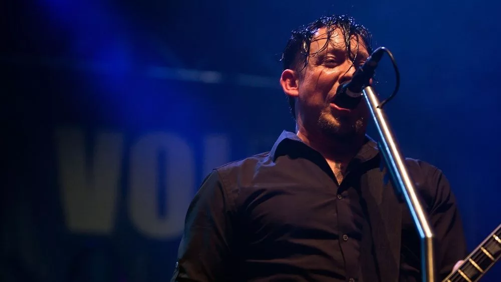 Singer and guitar player Michael Poulsen of Danish Heavy Metal rock band Volbeat performs on stage during the Gigantour tour on February 21^ 2012 in Kent^ Washington.