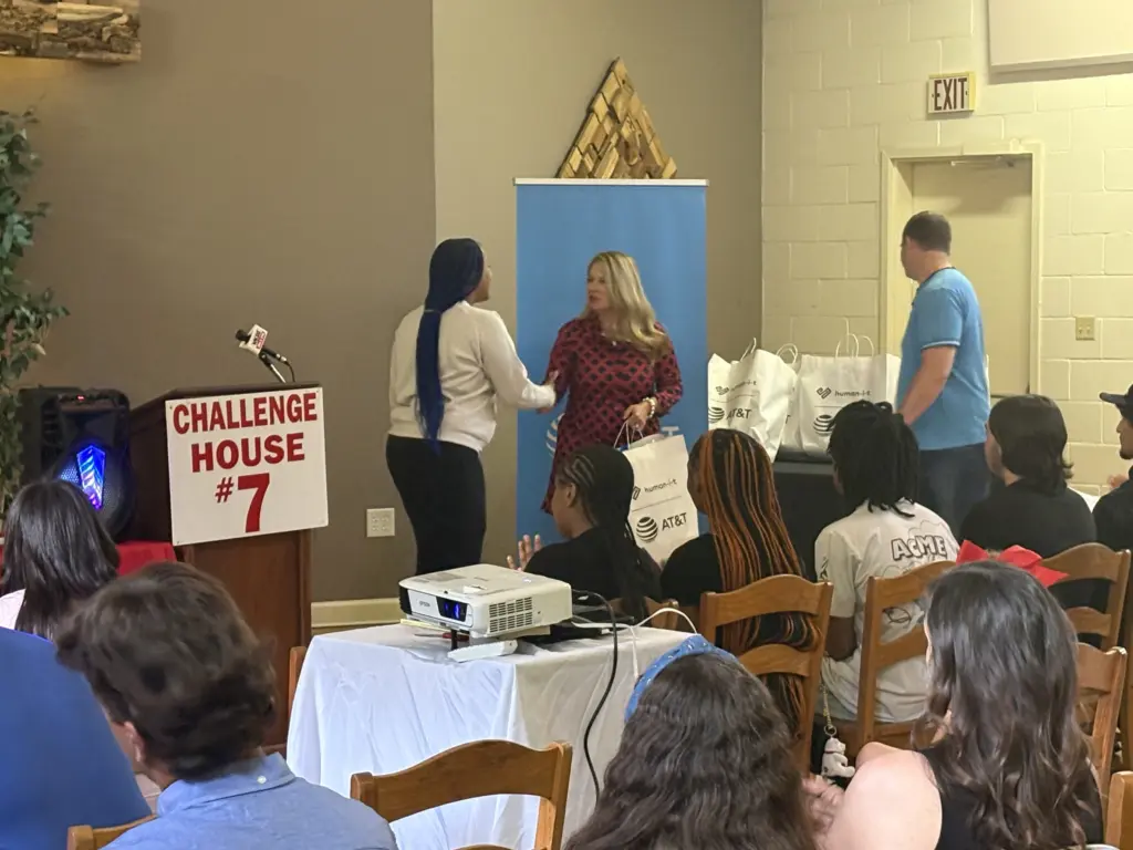 Amanda Lich, Regional Director of External Affairs, for AT&T Kentucky was on hand with representatives from the company to hand out laptops to the graduates. 