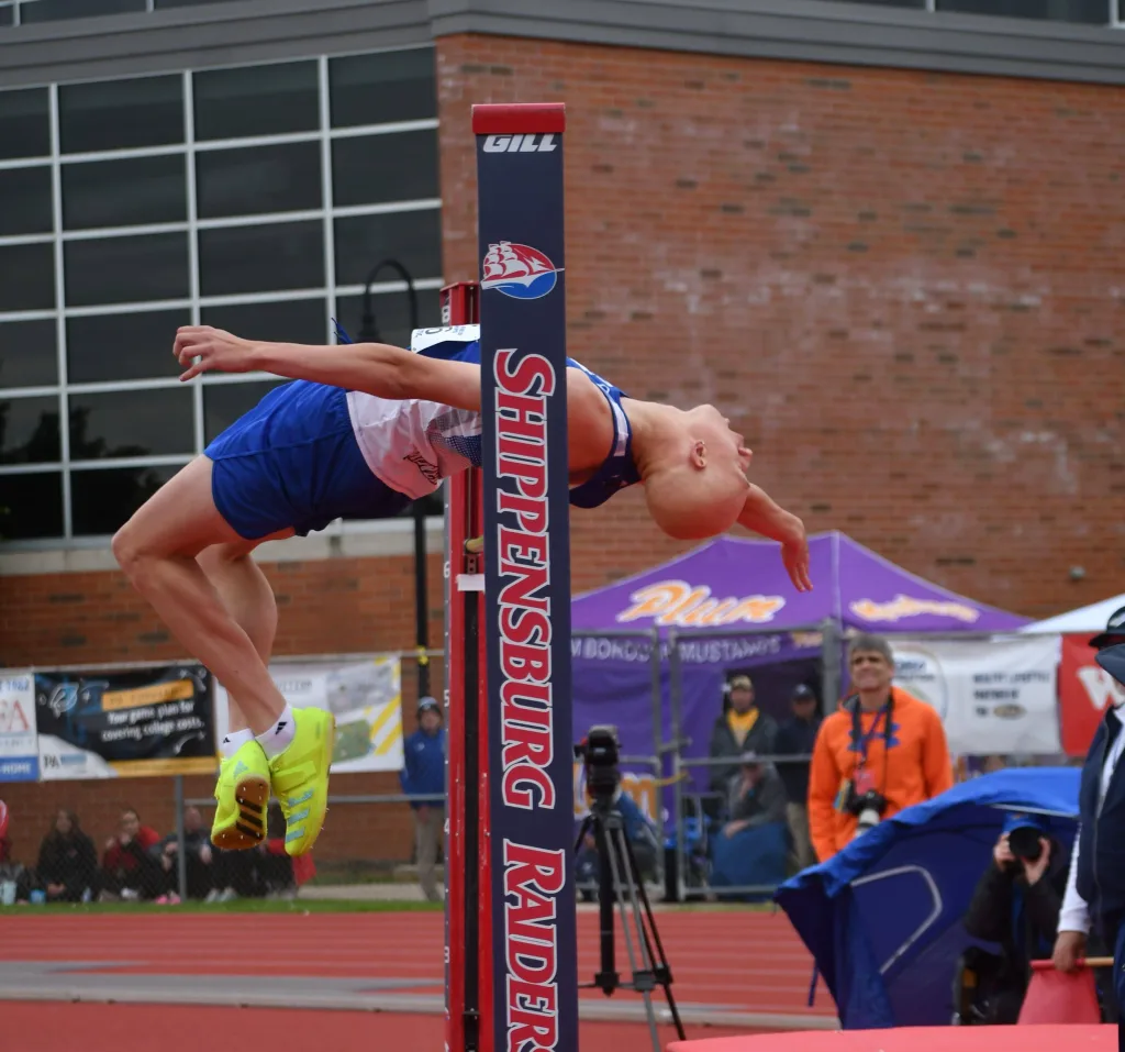 Minersville's Aidan Ryan clears 6-2 during the boys' Class AA high jump Friday at the PIAA Track and Field Championships at Shippensburg University (Photo by Brook Koch-Guers).