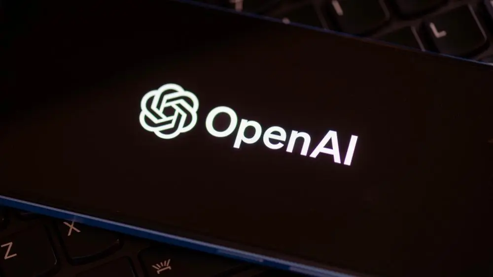 OpenAI logo seen on the screen of smartphone. AI software developer. London^ United Kingdom^ December 21^ 2022.