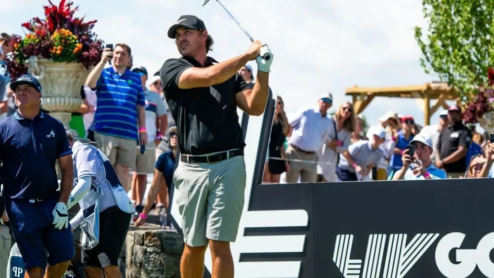 Brooks Koepka watches his shot during the LIV Golf Tournament held at the Trump National Golf Club in Bedminster^NJ. BEDMINSTER^NJ-AUGUST13^ 2023