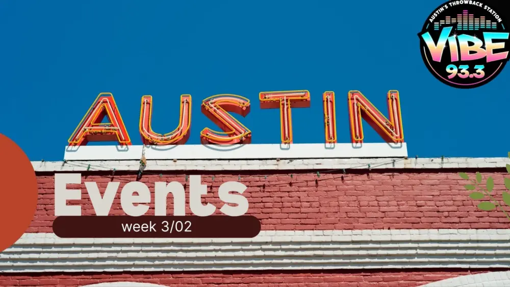 Austin sign on brick wall with vibe logo and text