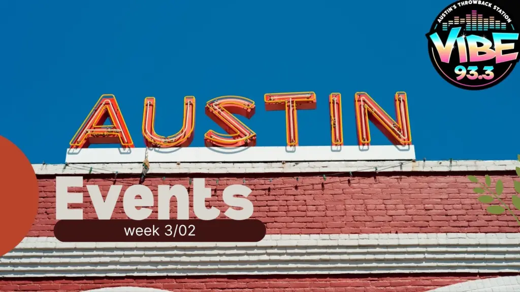 Austin sign on brick wall with vibe logo and text