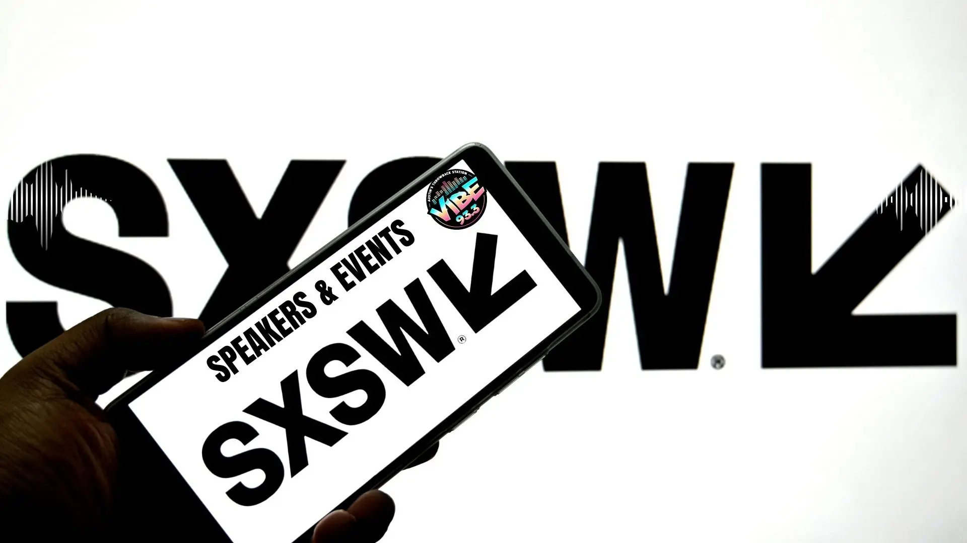 phone background with sxsw text: speakers & events and vibe logo