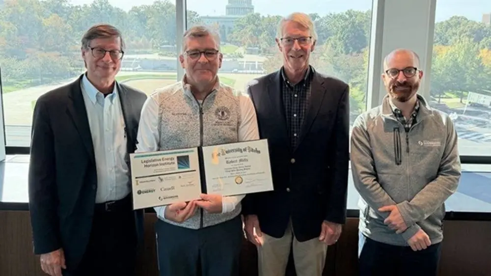 10-27-25-sen-robby-mills-energy-graduation-pic