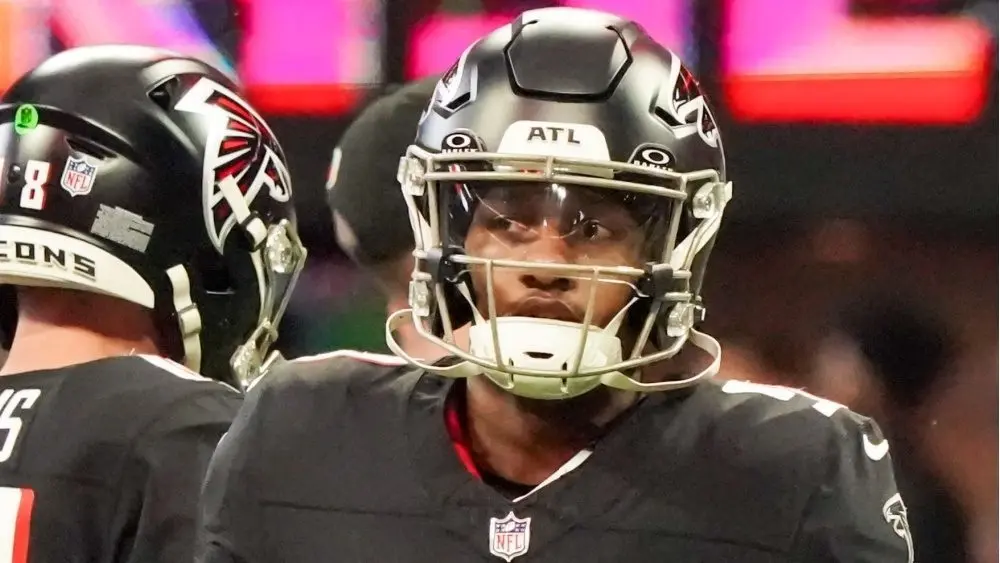Atlanta Falcons quarterbacks Michael Penix Jr (9) before the game against the Carolina Panthers on January 5^ 2025 at Mercedes-Benz Stadium.