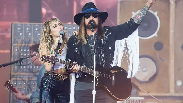 getty_mileybillyraycyrus_091725841321