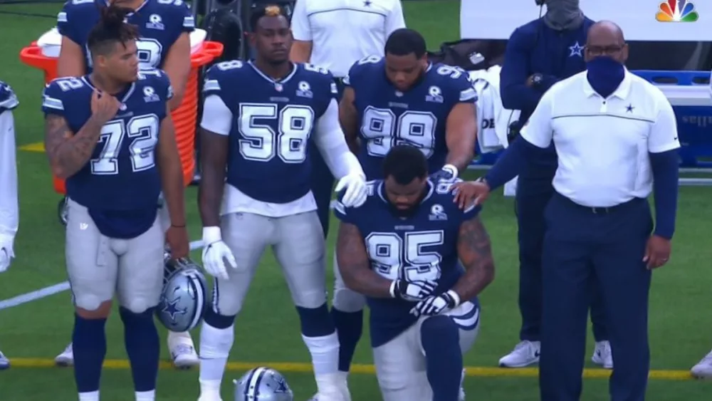 dontari-poe-kneel