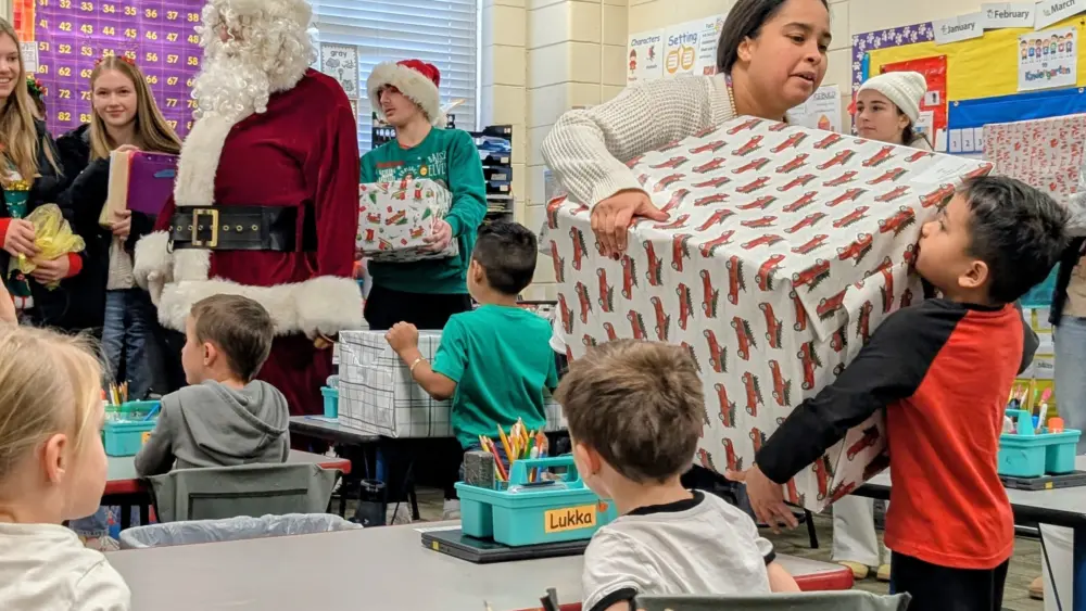 pxl_20251215_kid-with-gift