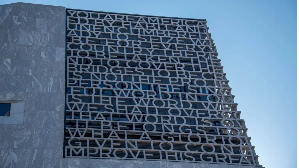 Chicago^ IL^ April 11^ 2026^ Barack Obama Presidential Center Tower with a blue sky background^ Presidential Library^ former President of the United States with words and letters on the exterior