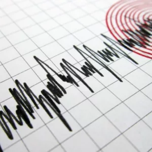 Seismograph and earthquake.A seismograph records the seismic activity of an earthquake