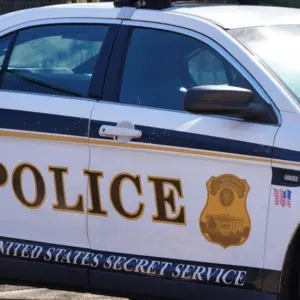 A United States Secret Service Police Car parked outside an entrance to the White House. Washington DC - February 23^ 2025