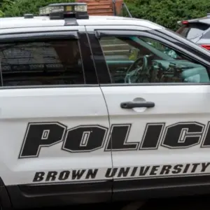 A police car in Brown University campus in Providence^ RI^ USA^ on November 10^ 2023. Brown University is a private Ivy League research university in Providence^ Rhode Island.