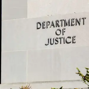 Sign of United States Department of Justice(DOJ) on their headquarters building in Washington^ D.C. USA. Washington D.C.^ USA - March 1^ 2020: