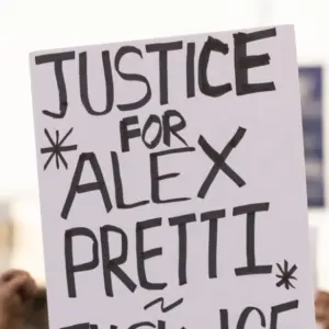 People protest the ICE killing of Alex Pretti in front of the downtown Federal Building. Los Angeles^ California^ USA - January 25^ 2026