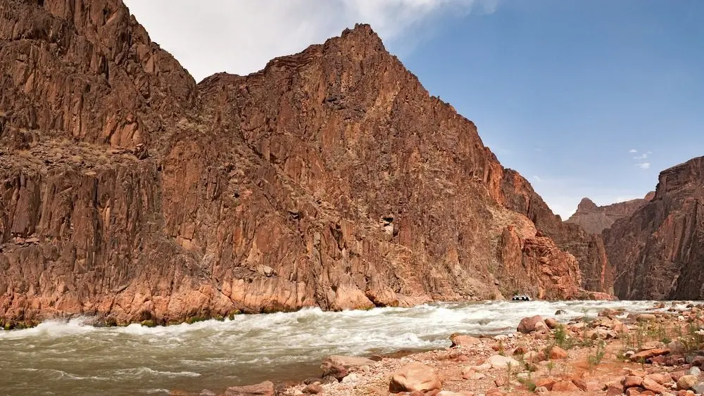 Raft approaching Granite Rapids in Grand Canyon National Park.
