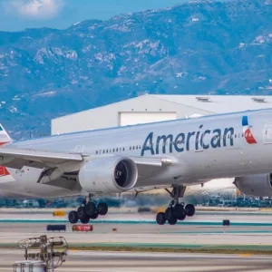 American Airlines Boeing 777-200 touches down at LAX International Airport December 22nd^ 2019. Los Angeles^ California.
