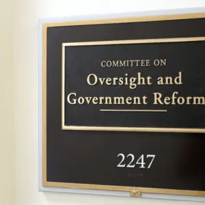 A sign at the entrance to a House Oversight Committee hearing room in Washington^ DC on July 18^ 2017. The House of Representatives is the lower chamber of the US Congress.