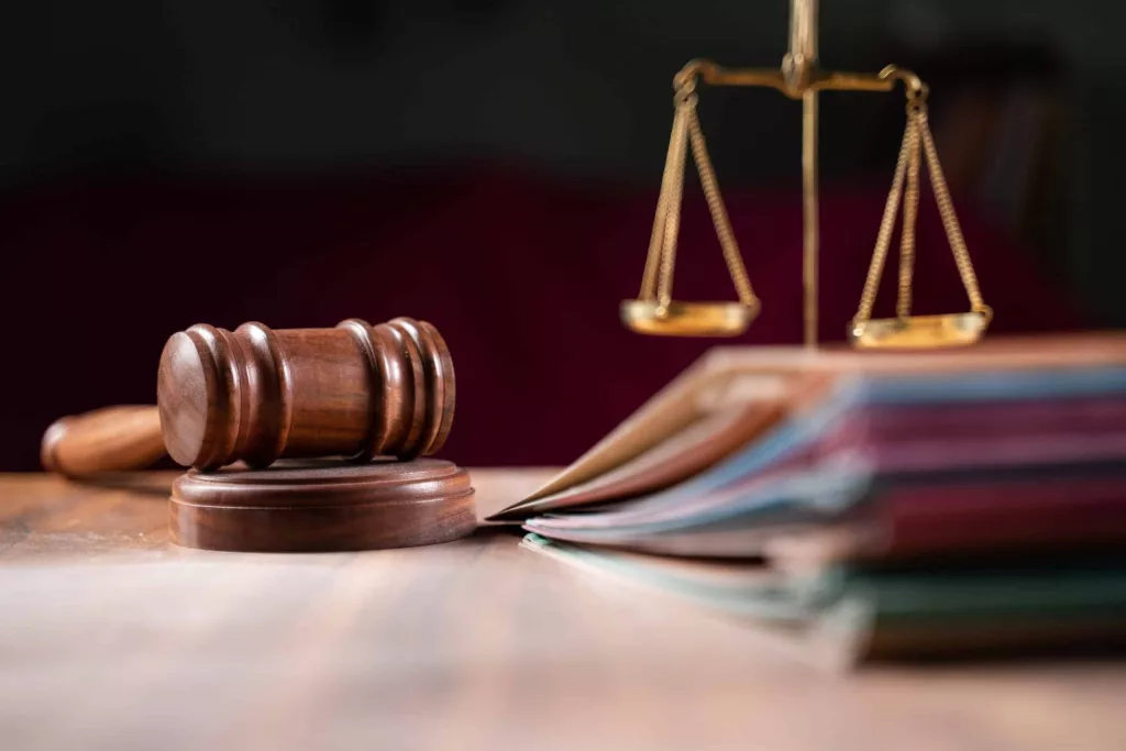 focus-on-hammer-group-of-files-on-judge-table-covered-with-dust-concept-of-pending-old-cases-or-work-at-judicial-court-7