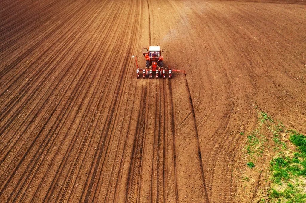 aerial-view-of-tractor-with-mounted-seeder-performing-direct-seeding-3