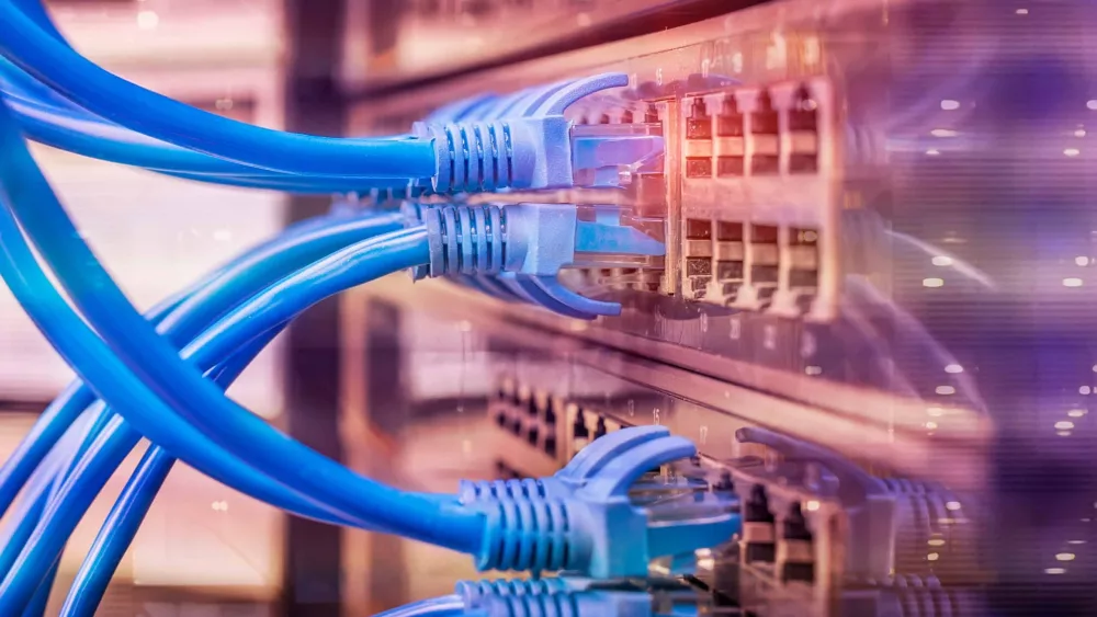 server-rack-with-blue-and-red-internet-patch-cord-cables-connect-3