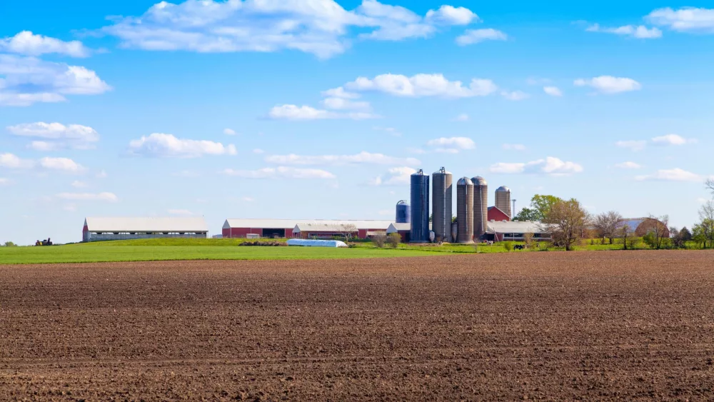 american-farmland-with-blue-cloudy-sky