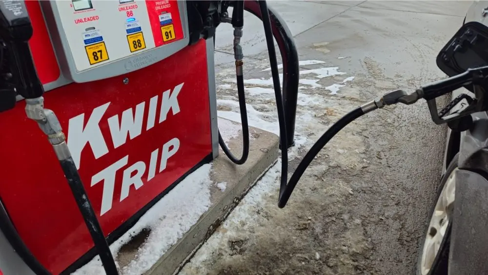 A Kwik Trip gas pump with snow on the ground. Kwik Trip is a popular chain of convenience stores and gas stations in the Midwestern United States (Minnesota, USA - Jan, 3, 2026). For Editorial Use.