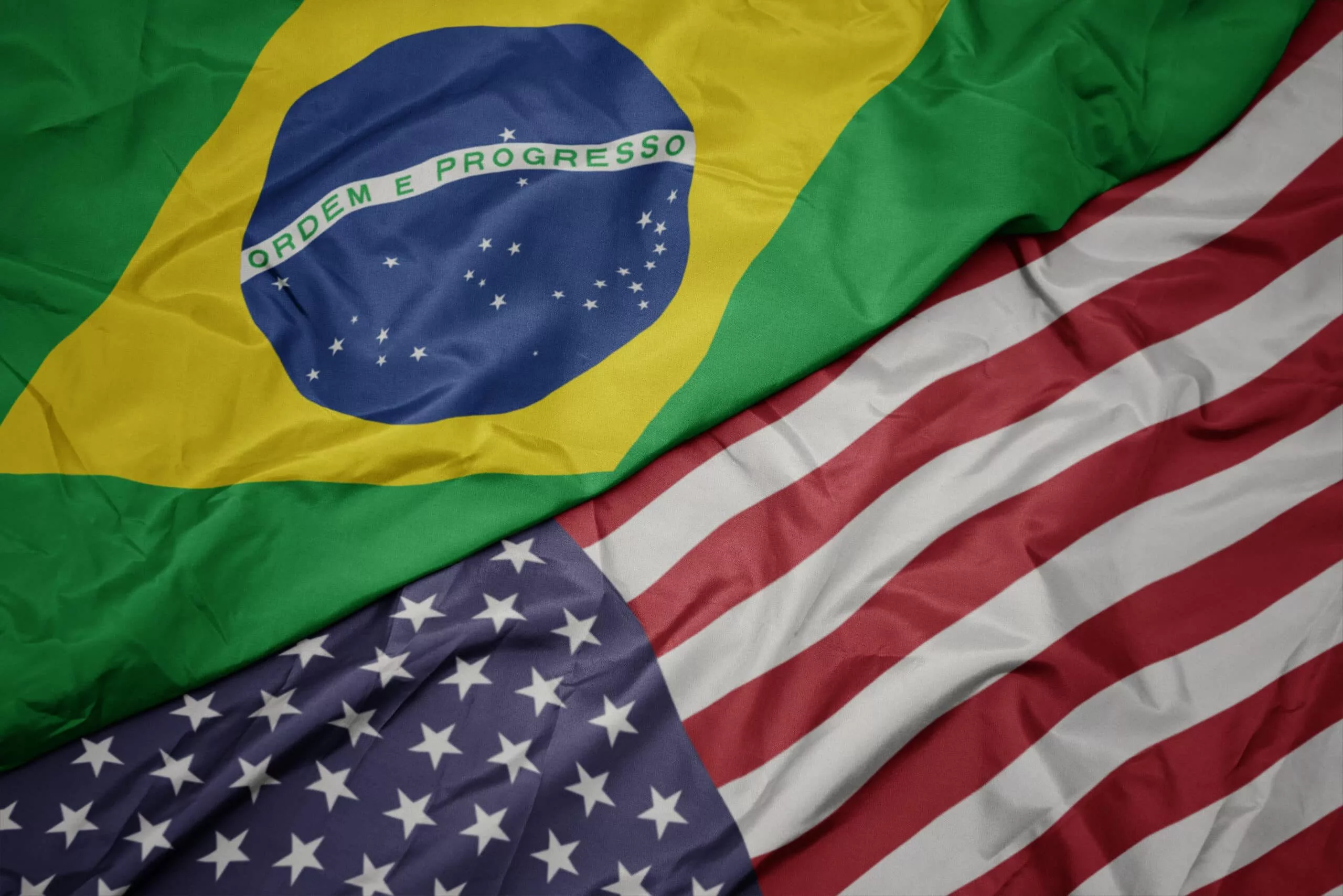waving-colorful-flag-of-united-states-of-america-and-national-flag-of-brazil