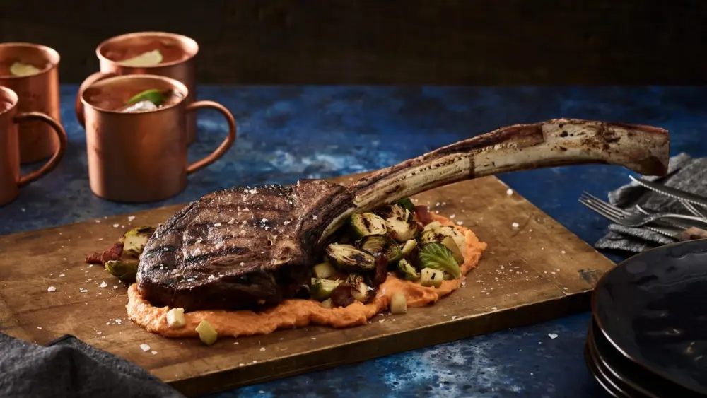 tomahawk-steak-with-grilled-brussels-sprouts-and-sweet-potato-puree