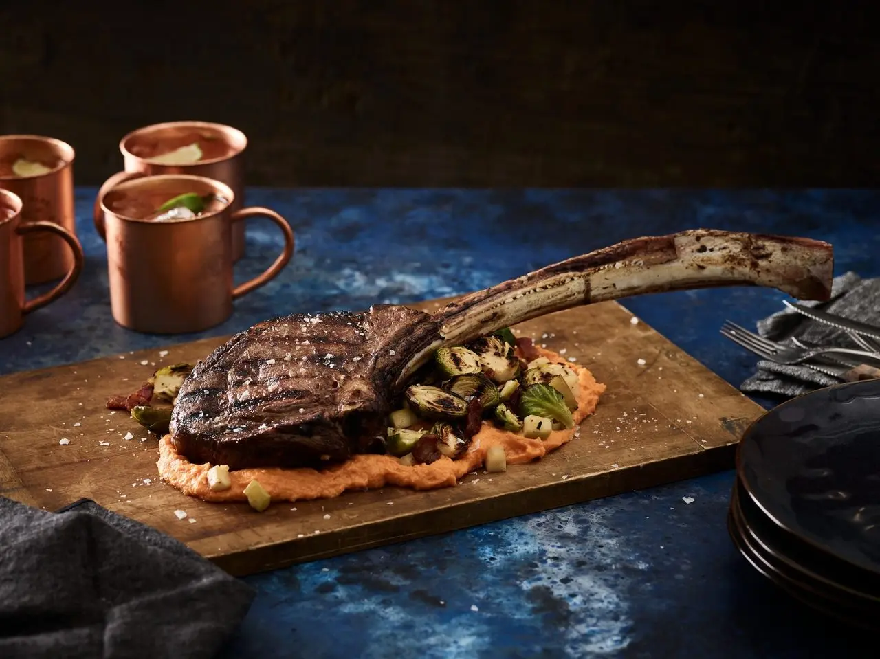 tomahawk-steak-with-grilled-brussels-sprouts-and-sweet-potato-puree