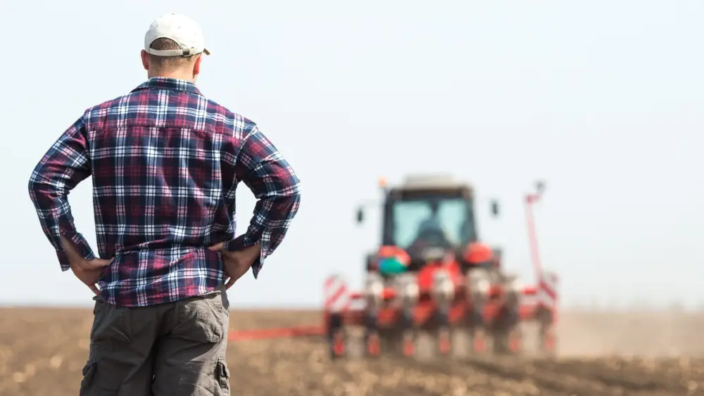 young-farmer-on-farmland