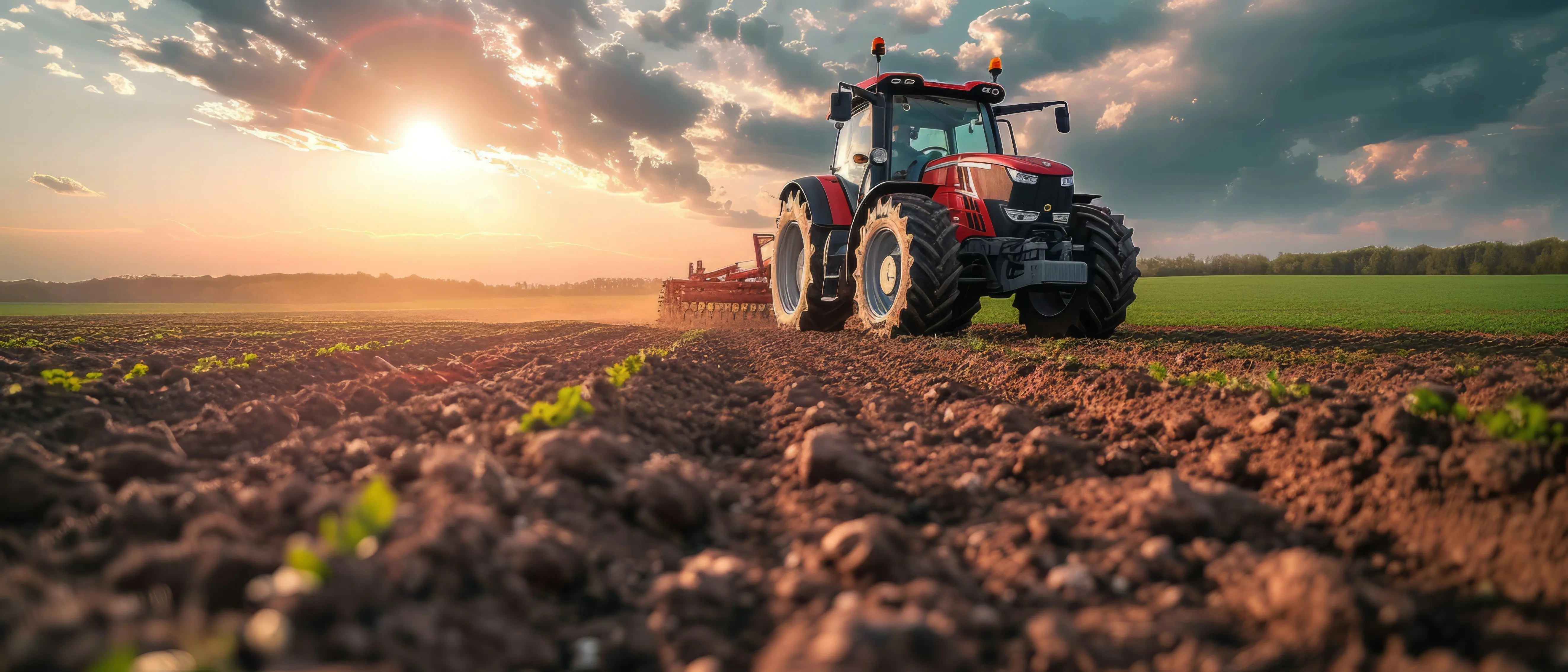 a-farmer-in-a-tractors-and-harvester-working-in-the-field-to-prepares-the-ground-agriculture-concept-suitable-for-production-a-tractor-on-a-soybean-farm-in-the-spring-sunset-generative-ai