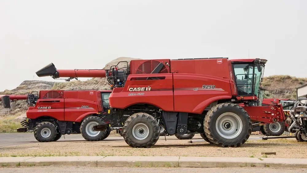 Downloaded Save to Library Preview Crop Find Similar File #: 2123058925 DRUMHELLER, ALBERTA, CANADA - 25 JULY, 2026. Red Case IH Axial-Flow 9250 combine harvesters parked at an Rocky Mountain Equipment agricultural equipment dealership lot