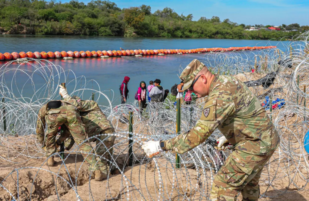 Concertina wire is installed along the banks of the Rio Grande River as part of "Operation Lone Star," Texas Gov. Greg Abbott's border security mission. Texas Gov. Greg Abbott via X