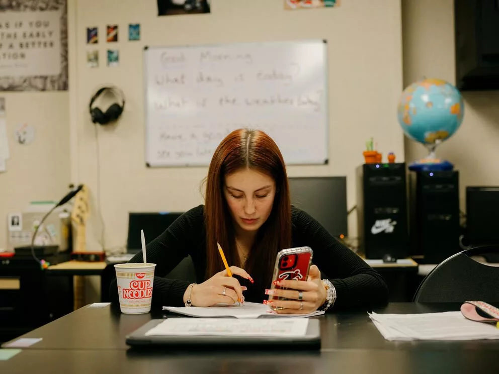 Emma Pearson, 18, works through a packet at Choice High School in Shelton on Wednesday, February 19, 2025. (Grant Hindsley for Cascade PBS)