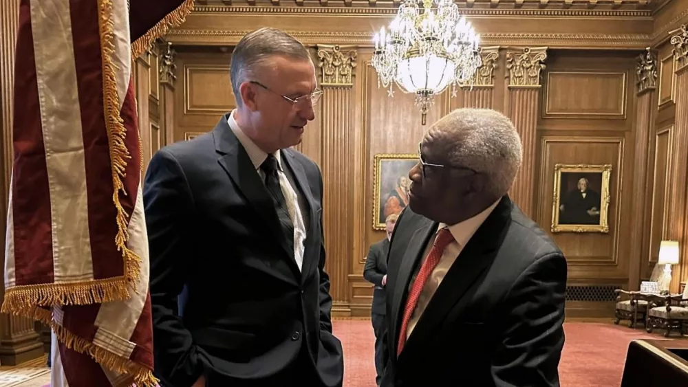 VA Secretary Doug Collins speaks with U.S. Supreme Court Justice Clarence Thomas. Courtesy of VA | X