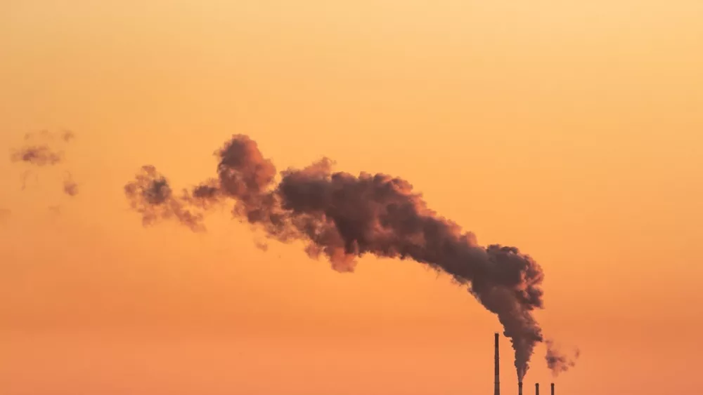 Photo by Marek Piwnicki: https://www.pexels.com/photo/a-gray-smoke-from-industrial-chimney-under-orange-sky-12214816/