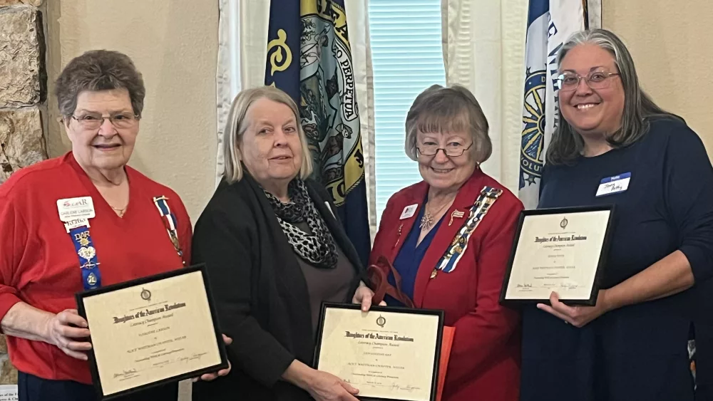 (from left to right) Darlene Larson, Jan Goodheart, AWC Literacy Program Chair Judi Wutzke, and Jenny Petty