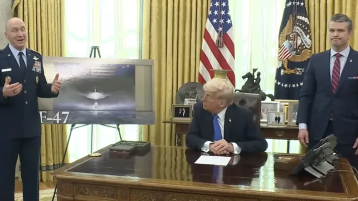 President Donald Trump, flanked by Pentagon leaders, unveils the next generation stealth airplane, called the F-47, designed to fly alongside drones. U.S. Department of Defense screenshot