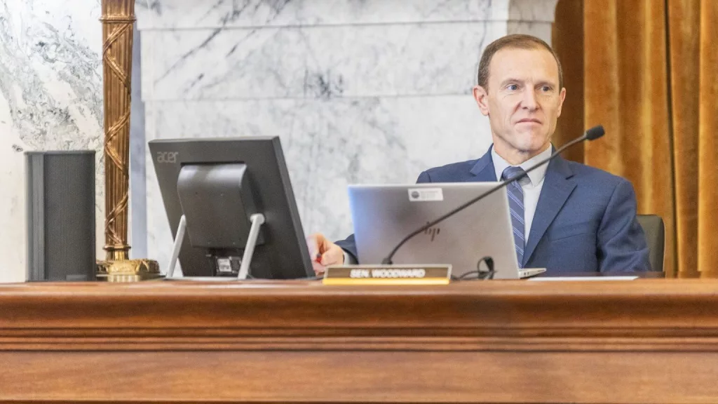 Idaho state Sen. Jim Woodward, R-Sagle, listens to proceedings during a Joint Finance-Appropriations Committee meeting at the Statehouse on Jan. 7, 2025, in Boise. (Pat Sutphin for the Idaho Capital Sun)