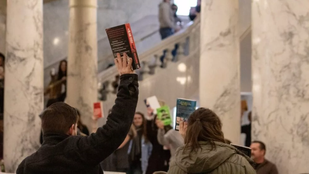 As Republican lawmakers across the U.S. have implemented laws allowing individuals to request the removal of books they believe are harmful to minors — such as in neighboring Idaho as shown in the photo above — Democratic Oregon lawmakers are taking a different approach through Senate Bill 1098. (Mia Maldonado/Idaho Capital Sun)