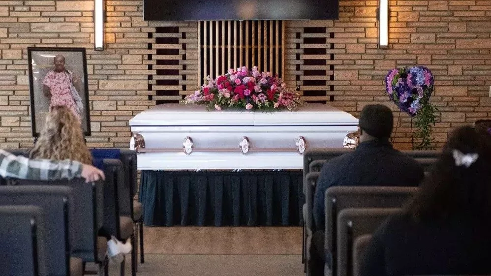 Family, friends and community members attended the funeral of Sarah Niyimbona who died by suicide on April 13 at Providence Sacred Heart Medical Center in Spokane. Erick Doxey/InvestigateWest)