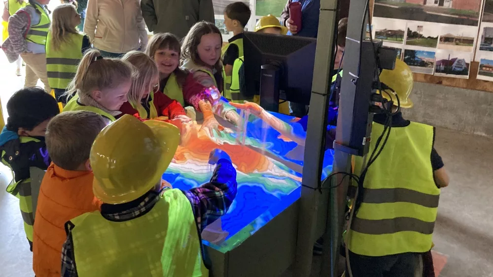 2024 Public Works Expo – GIS Station (JPG) Students played with a sandbox that mapped topography in real time based on their actions.