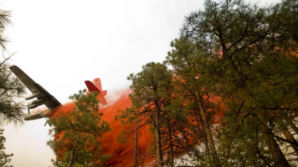 A DC-10 air tanker drops fire retardant on Magpie Gulch during the Horse Gulch Fire on July 15, 2024. (Photo courtesy of Northern Rockies Incident Command)