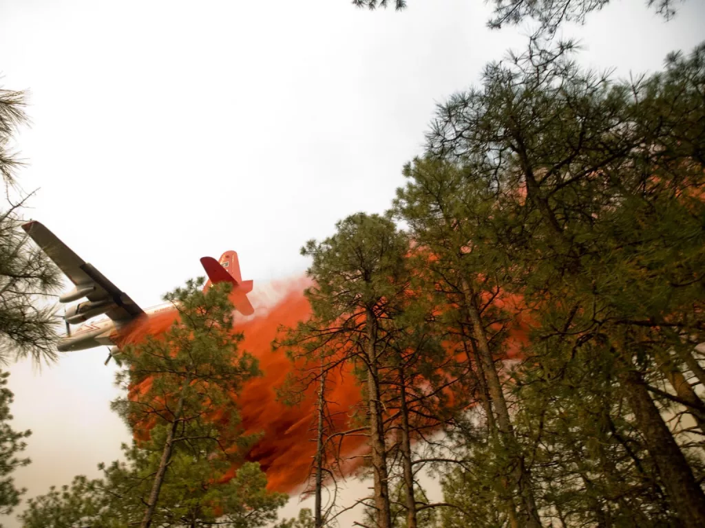 A DC-10 air tanker drops fire retardant on Magpie Gulch during the Horse Gulch Fire on July 15, 2024. (Photo courtesy of Northern Rockies Incident Command)