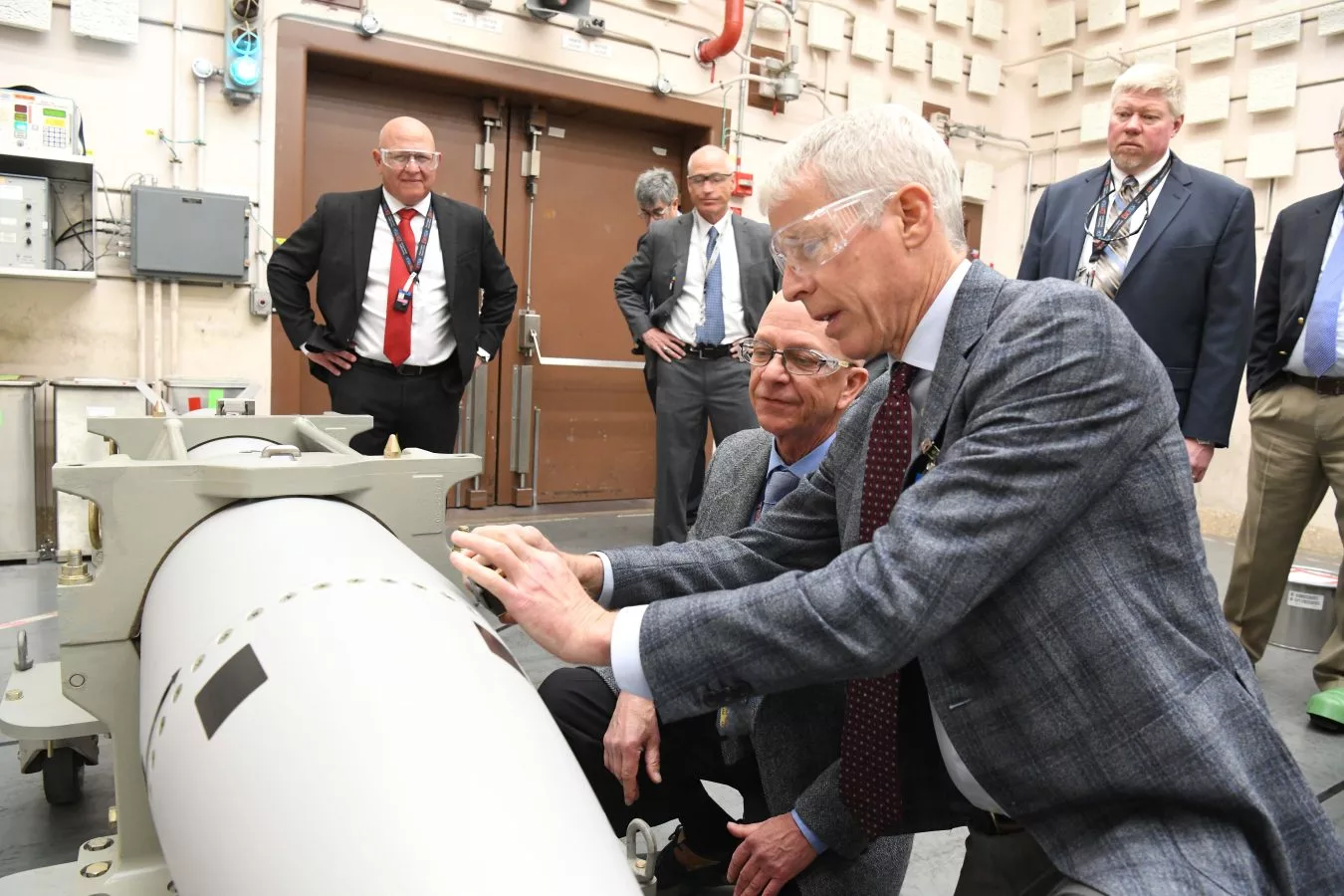 Secretary of Energy Chris Wright stamps the first B61-13 unit.