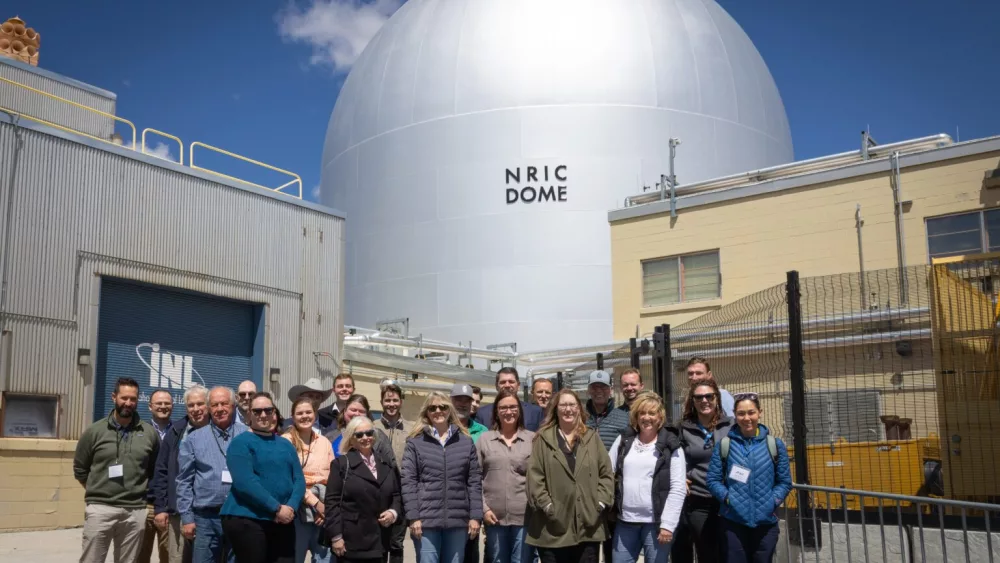 Members of the Idaho Legislature’s Joint Finance-Appropriations Committee and their staff pose for a photo outside of DOME at Idaho National Laboratory’s Materials and Fuels Complex on May 21. (Photo courtesy of Idaho National Laboratory)