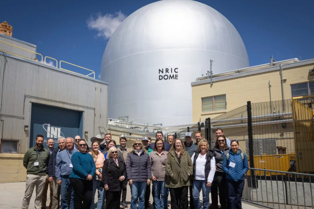 Members of the Idaho Legislature’s Joint Finance-Appropriations Committee and their staff pose for a photo outside of DOME at Idaho National Laboratory’s Materials and Fuels Complex on May 21. (Photo courtesy of Idaho National Laboratory)